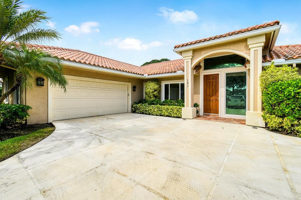 Beauty, Warmth & Value In This Custom Pool Home